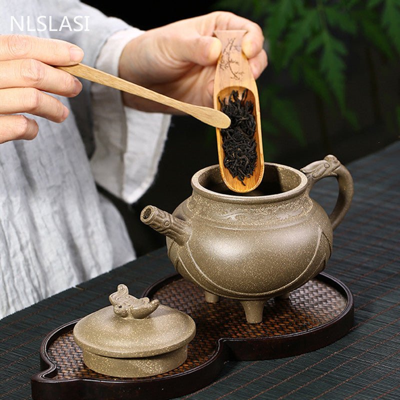 https://cdn.shopify.com/s/files/1/0487/9322/3324/products/intricately-asian-handmade-xi-shi-yixing-teapot-300ml-coffee-servers-tea-pots-524_1024x1024.jpg?v=1665501628