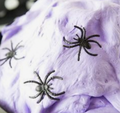 Purple slime with halloween embellishments like black spiders