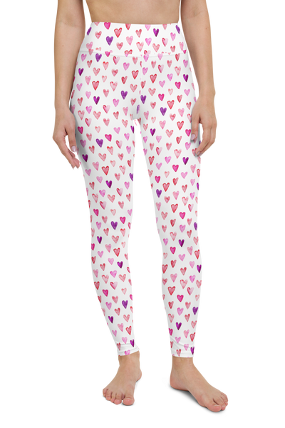 front view of woman wearing pixibu apparel pink red and purple heart print yoga pants