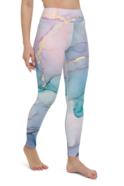 side view of woman wearing marble print pink blue purple and gold leggings by pixibu apparel