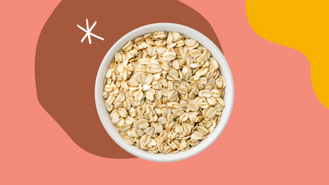 bowl of oats against colorful backdrop