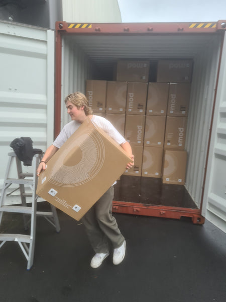 Sanipure employees unloading Oransi air purifiers in New Zealand