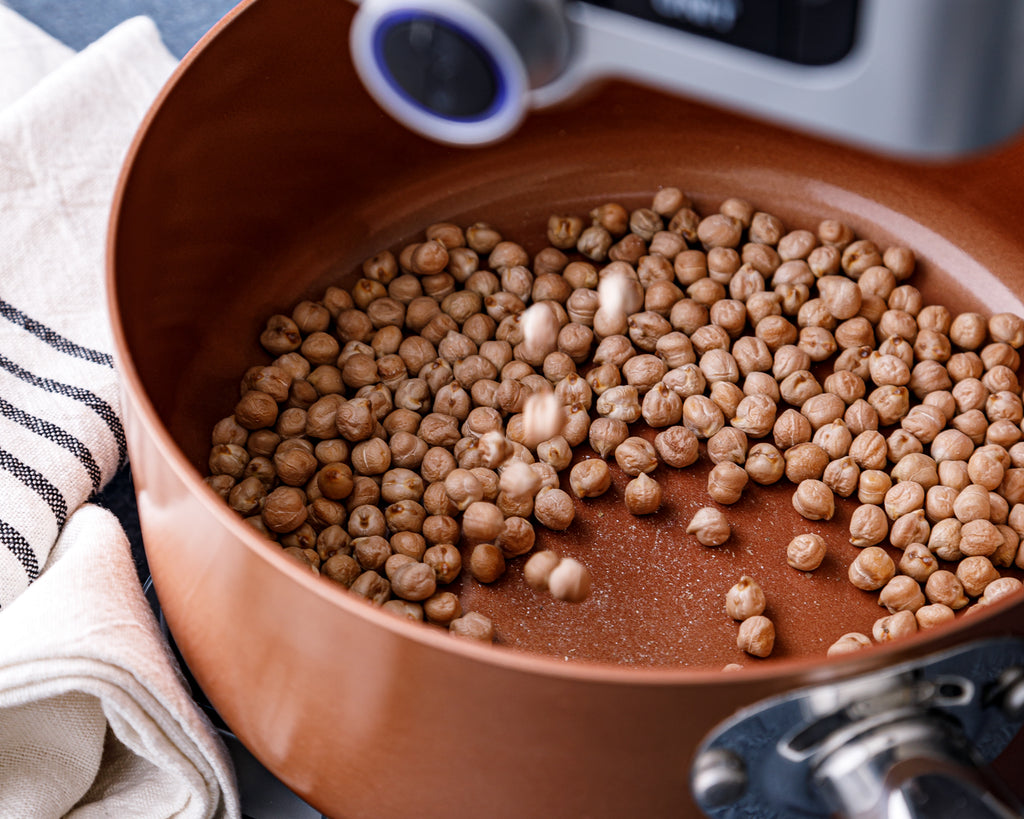 PantryChic dispensing dried chickpeas / garbanzo beans into a pot