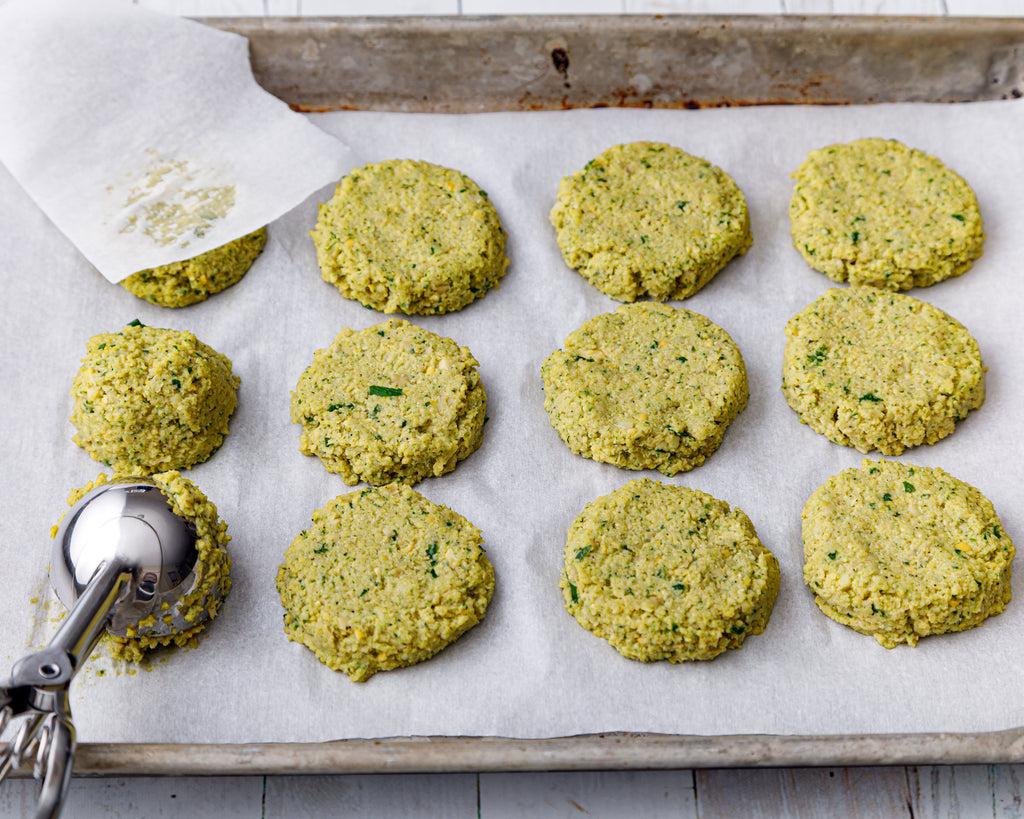 Homemade falafel being formed into patties