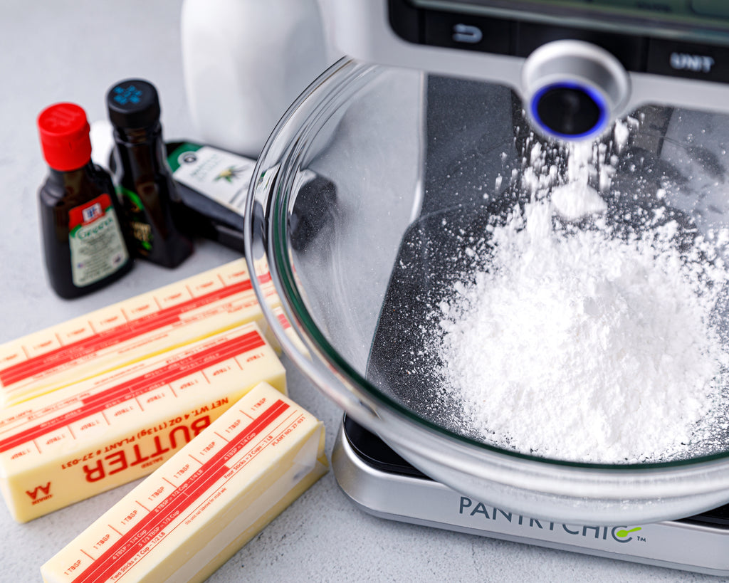 Starting the frosting by dispensing powdered sugar