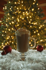 Maple syrup hot chocolate with Christmas tree and white lights
