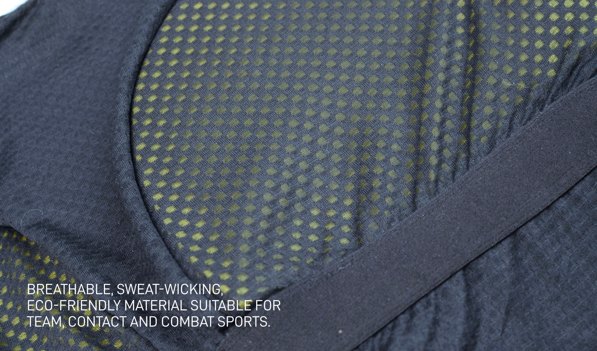 Inside of the AAVA Armoured Sports Bra: breathable mesh lining, support band and Poron XRD® material covering the chest area.
