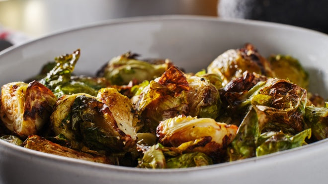 Cooked brussels sprouts in a bowl