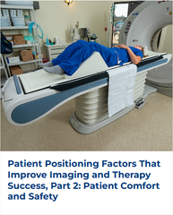 A woman laying down on the bed of a CT machine with her legs positioned using a foam wedge.