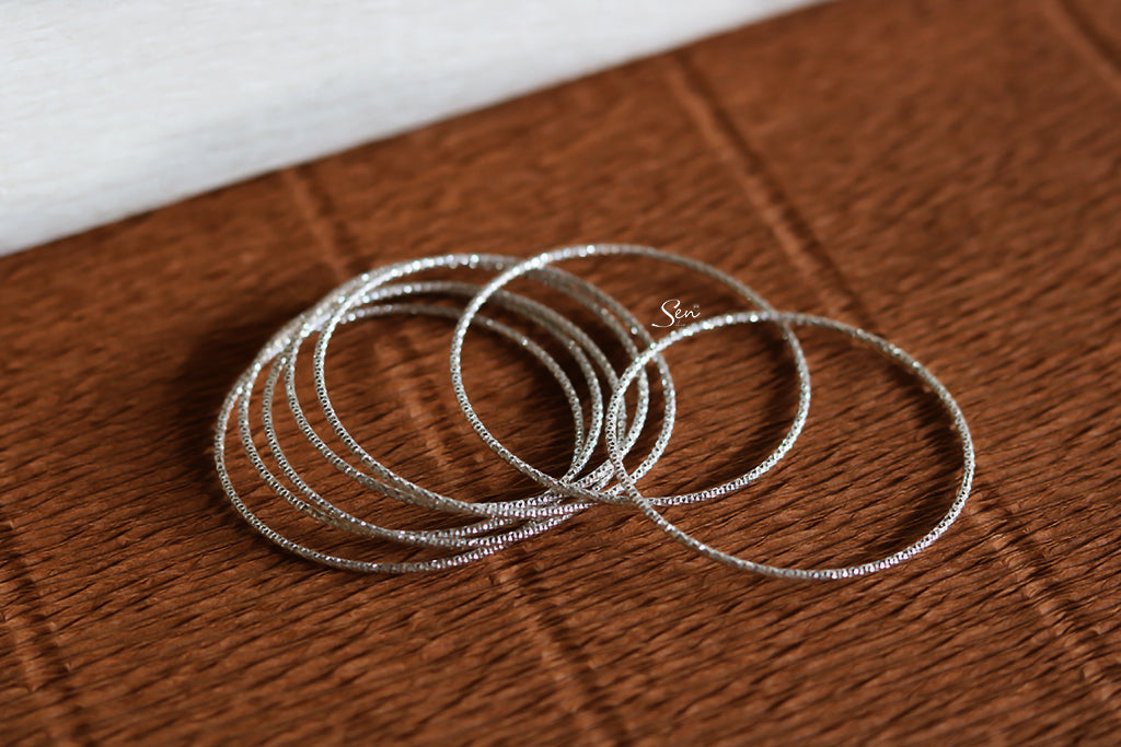 The silver baby bracelet holds profound symbolism regarding health protection and warding off negative energy.