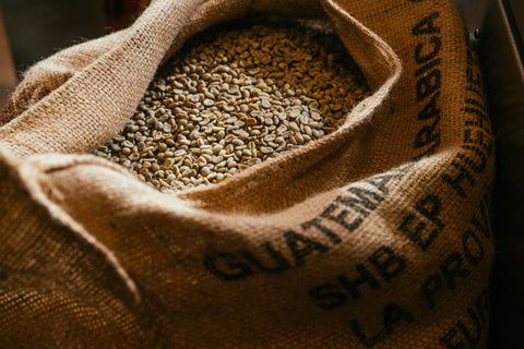 coffee beans in a a burlap bag