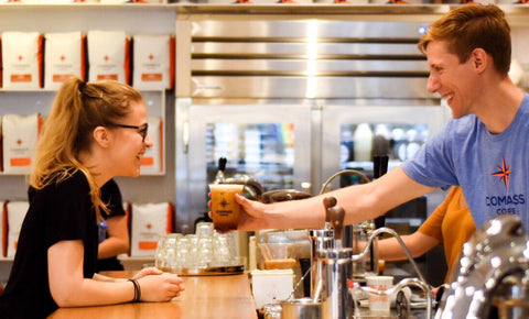 cold brew hand off at a cafe