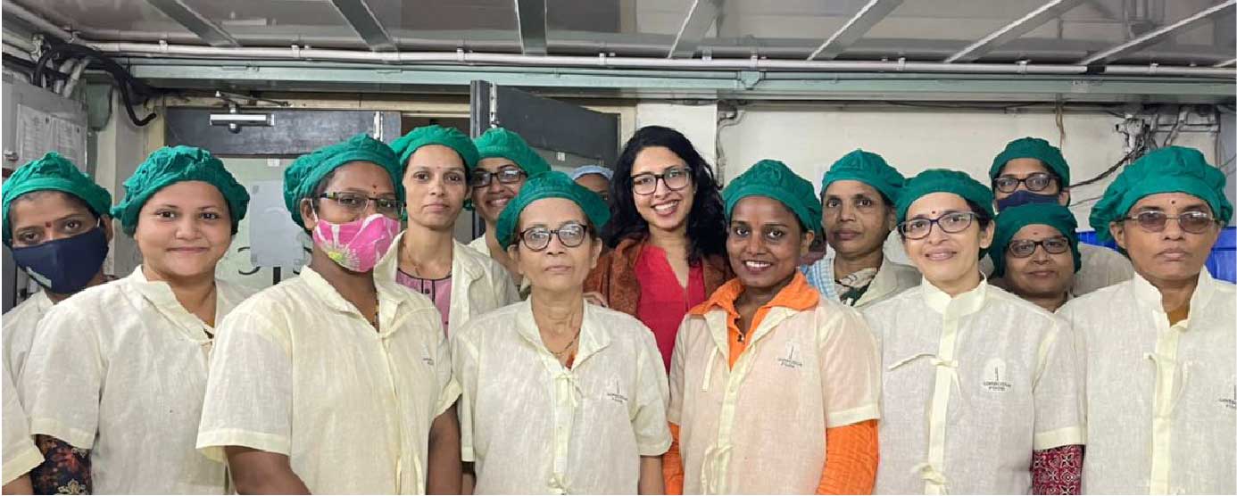 Shivi with workers
