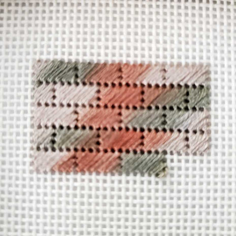 bricks stitched in a variegated needlepoint thread