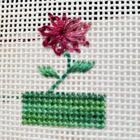 Variegated needlepoint thread and a Lazy Daisy stitch