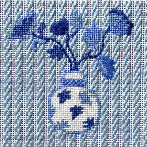 Blue and White Leaf Vase needlepoint with an open stitch background