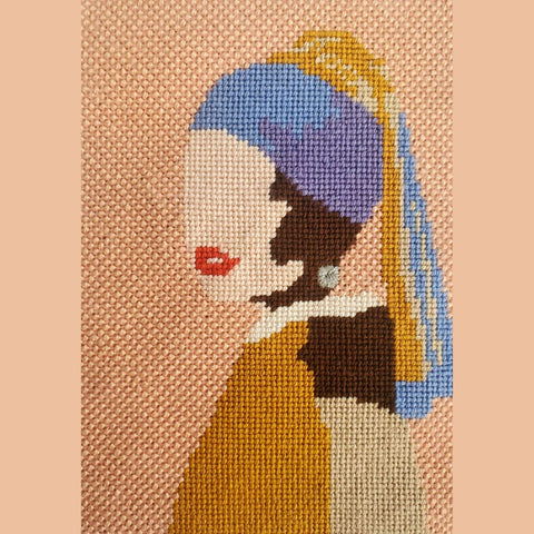 Needlepoint eyelet stitch shown on Girl With A Pearl Earring