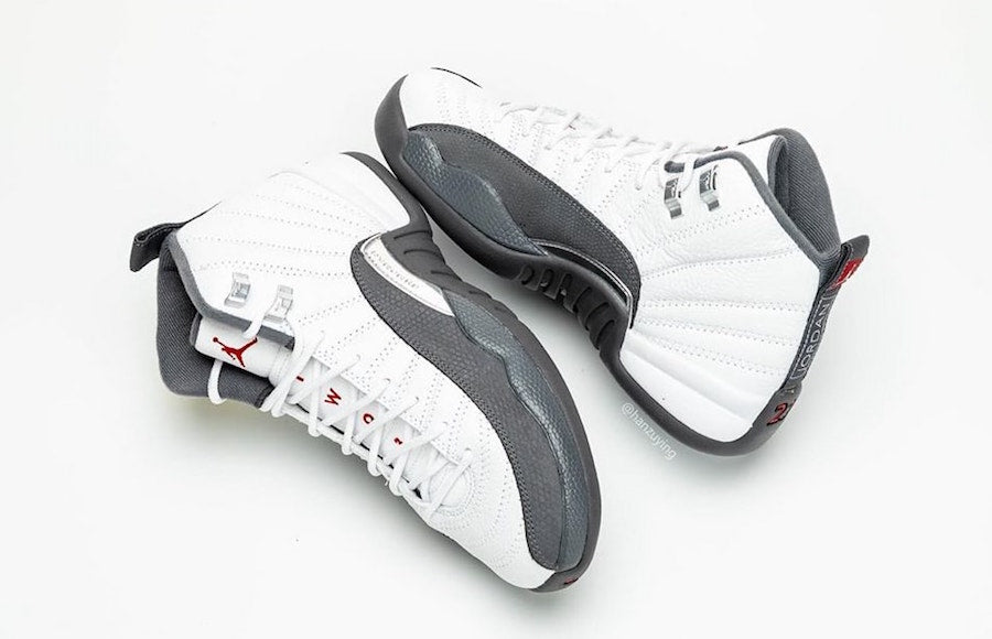 white and dark grey jordan 12