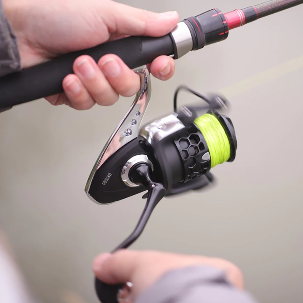Spinning reel with yellow braided fishing line