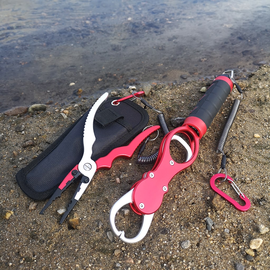 Fishing pliers and fish lip gripper