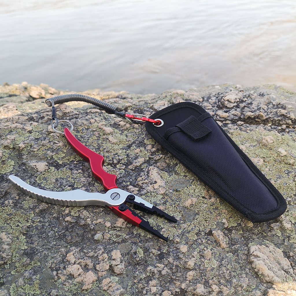 Fishing pliers with lanyard and sheath