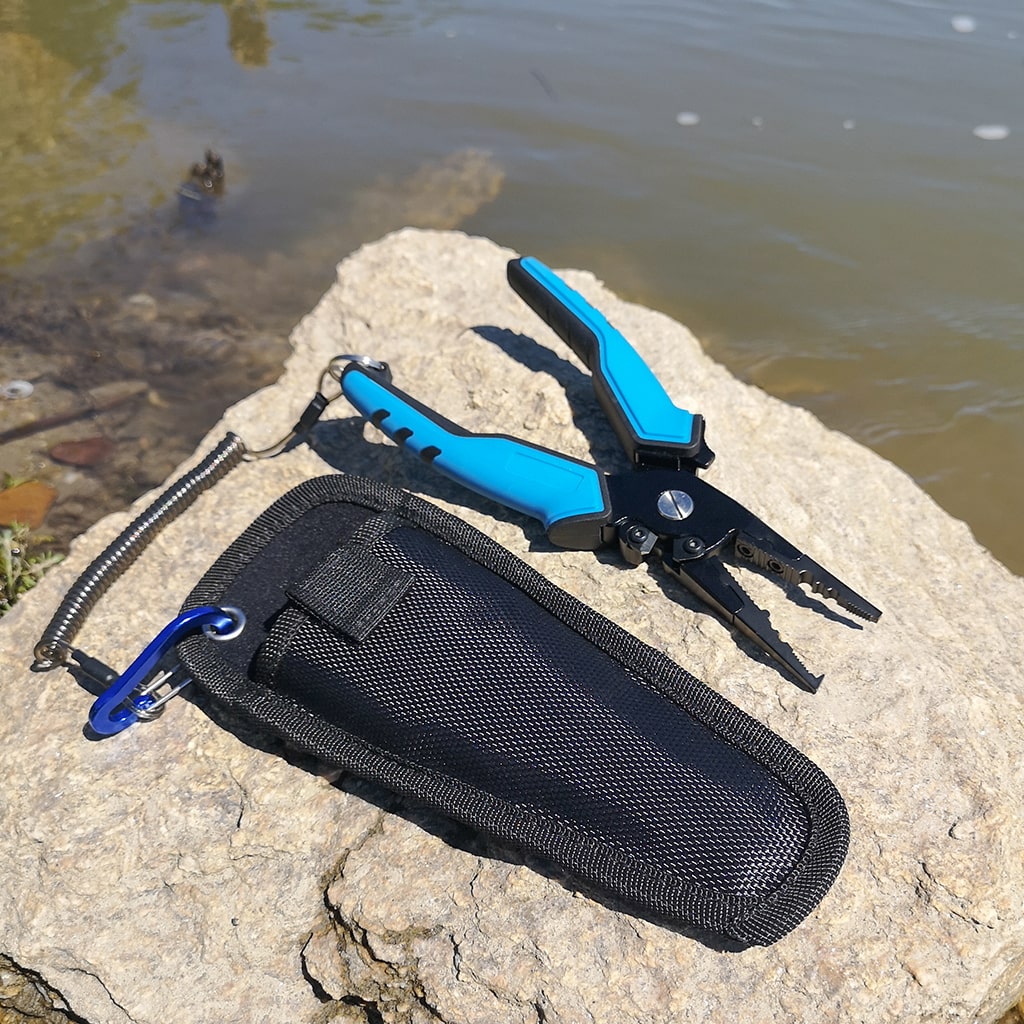 Fishing pliers with lanyard and sheath