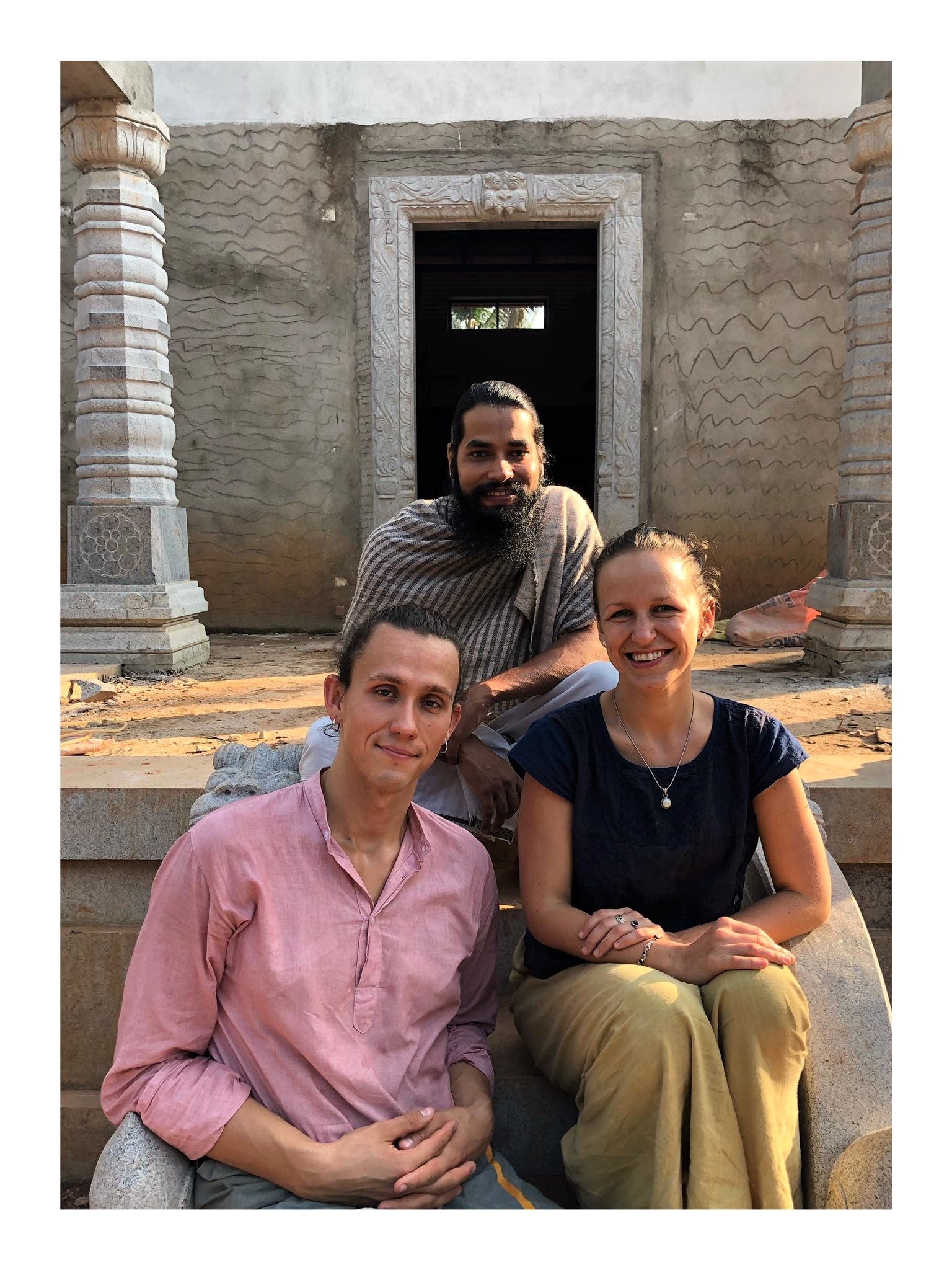 Yoga students and yoga guru in front of yoga shala in Pandeshwar, Karnataka, India