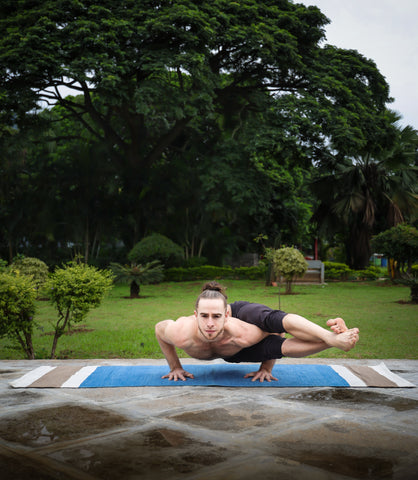 Ethan Ashtanga Ward second series on natural yoga mat