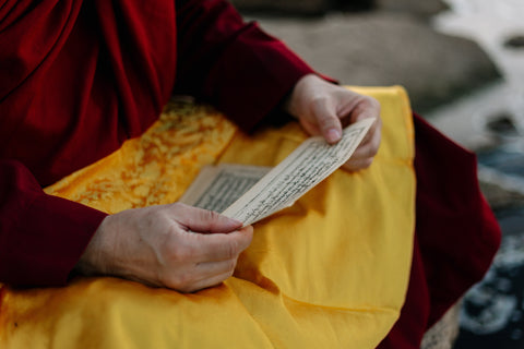 monk chanting ancient mantra