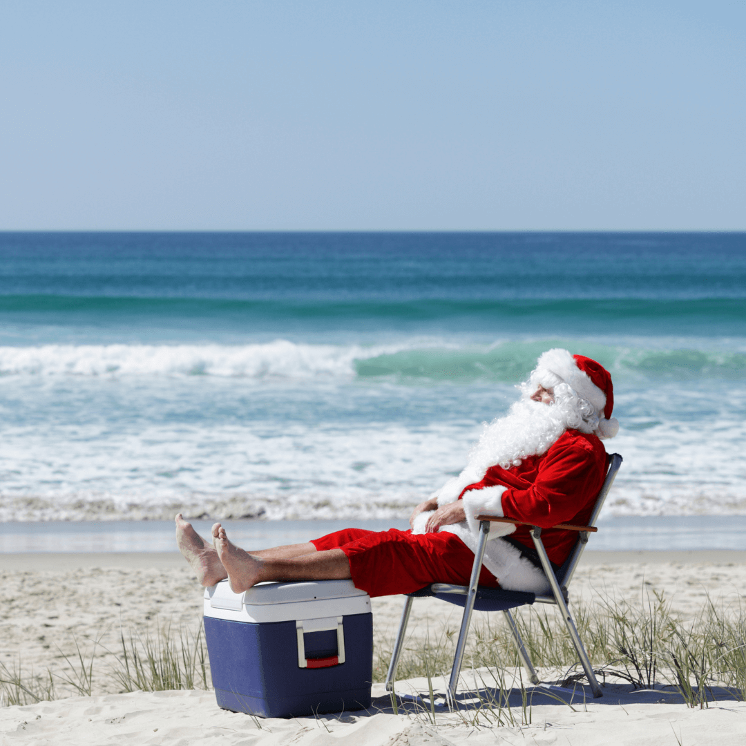 Santa on the beach relaxing - The gathering blog post - Leanne Carius - Feng Shui- Australia 2023