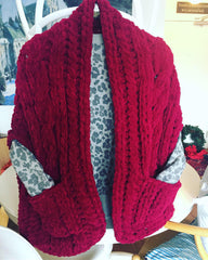 Red chenille Celtic shawl with pockets.