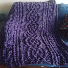 Chunky Celtic Cable Saxon Braid Blanket in mauve chenille loop yarn