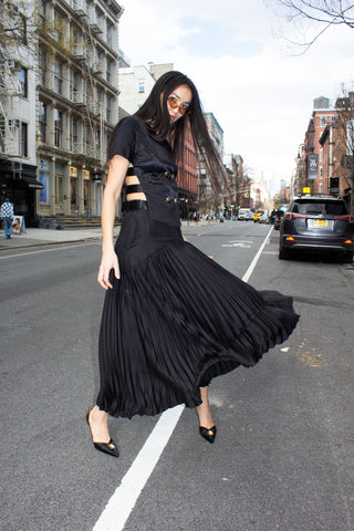 Le Reussi crop top and long black pleated skirt
