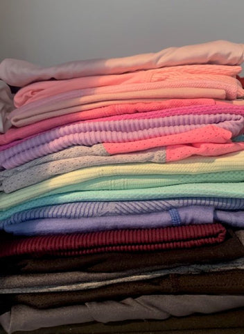 This is my little folded pile of active-wear tops, stacked up in colours.