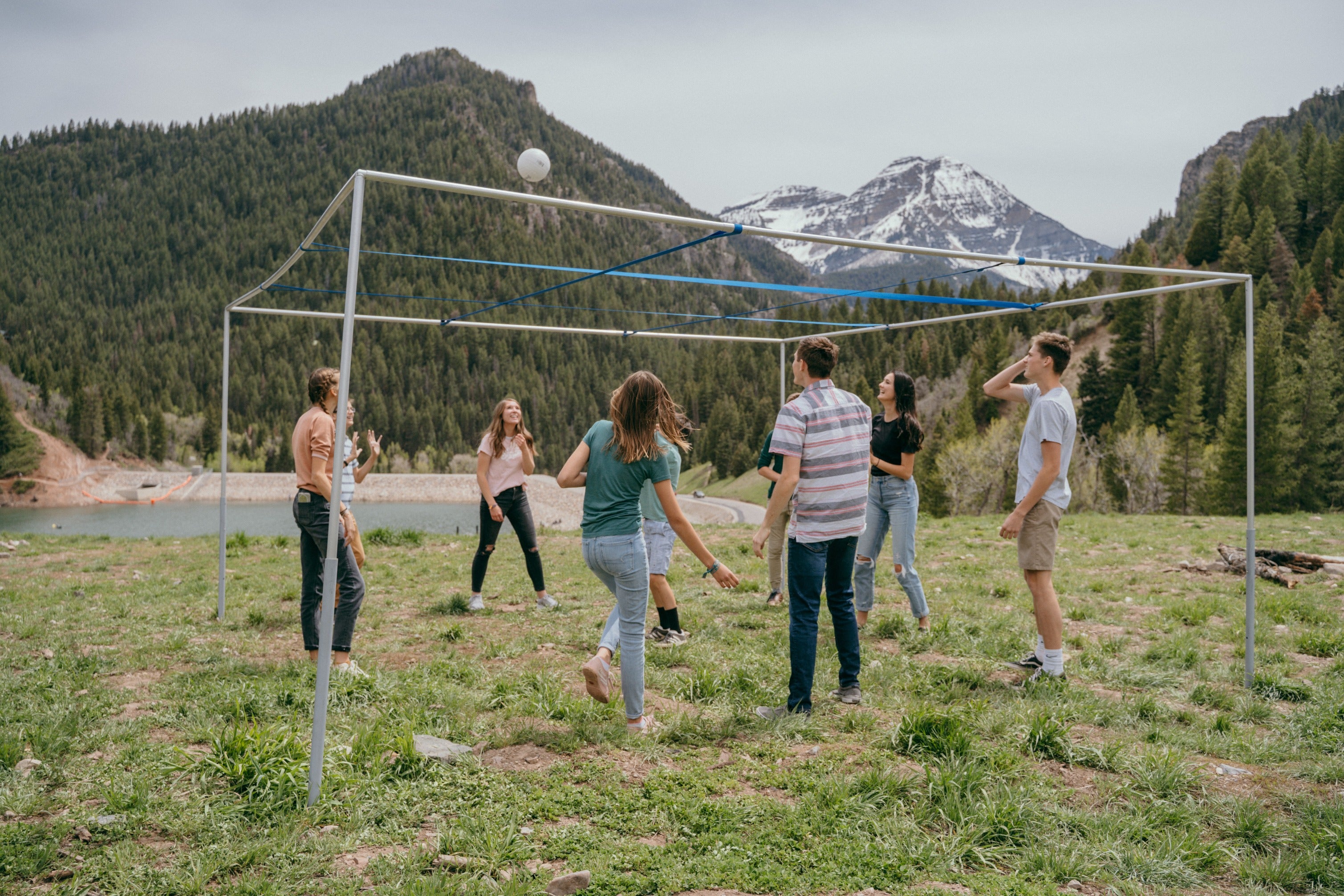 People playing 9 Square Game Set in the Mountains