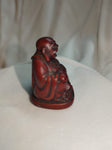 Tiny Red Resin Buddha Figurine