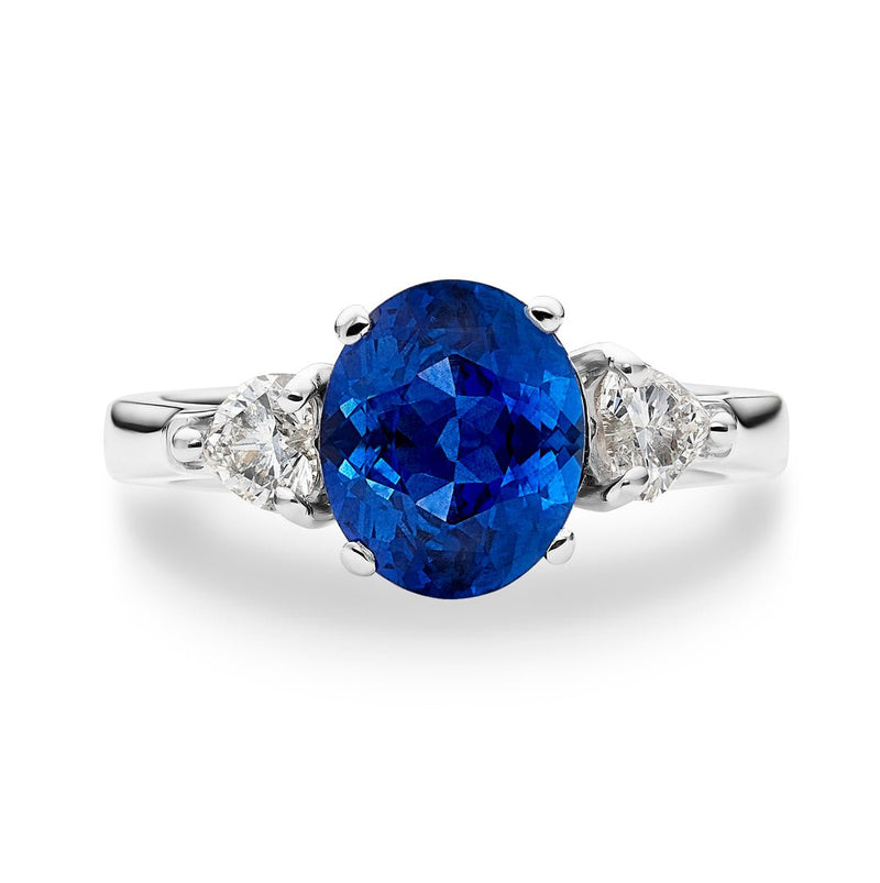 engagement ring with blue sapphire under diamond