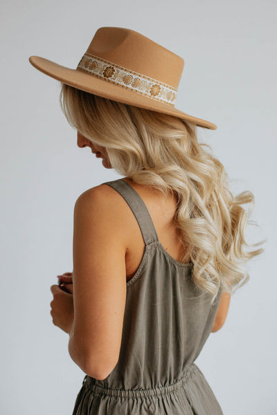 tan flat brim hat