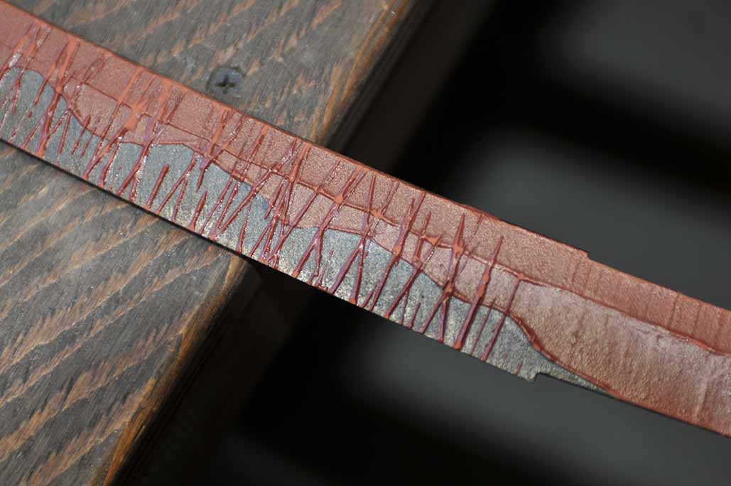 Japanese sword blade coated with clay