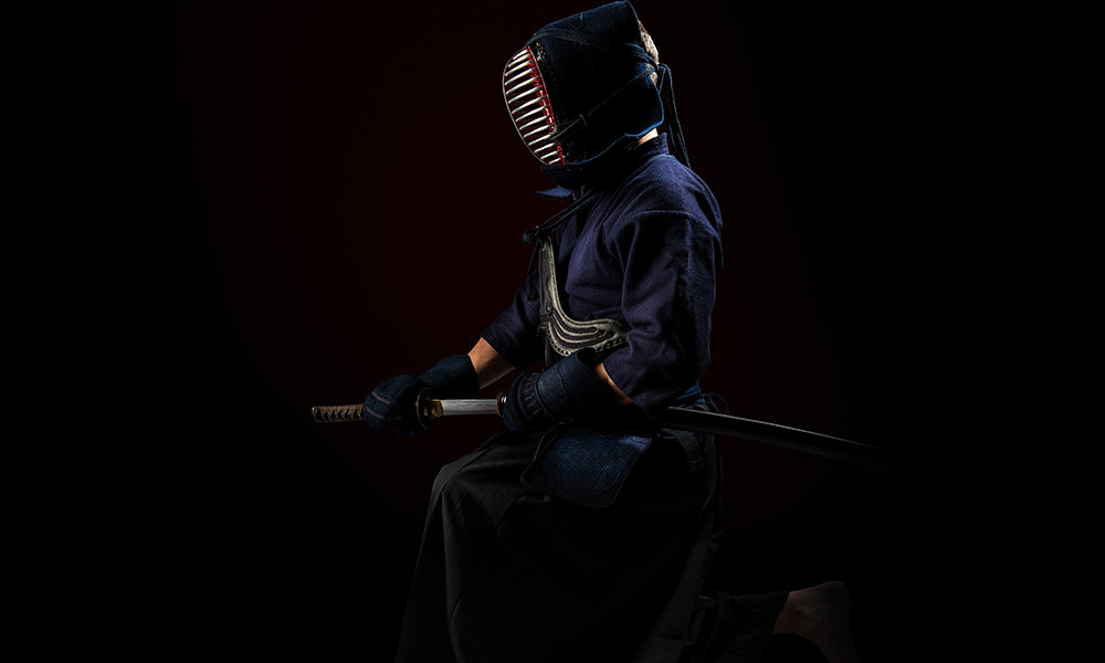 Kendo player sheathing Japanese Sword Katana