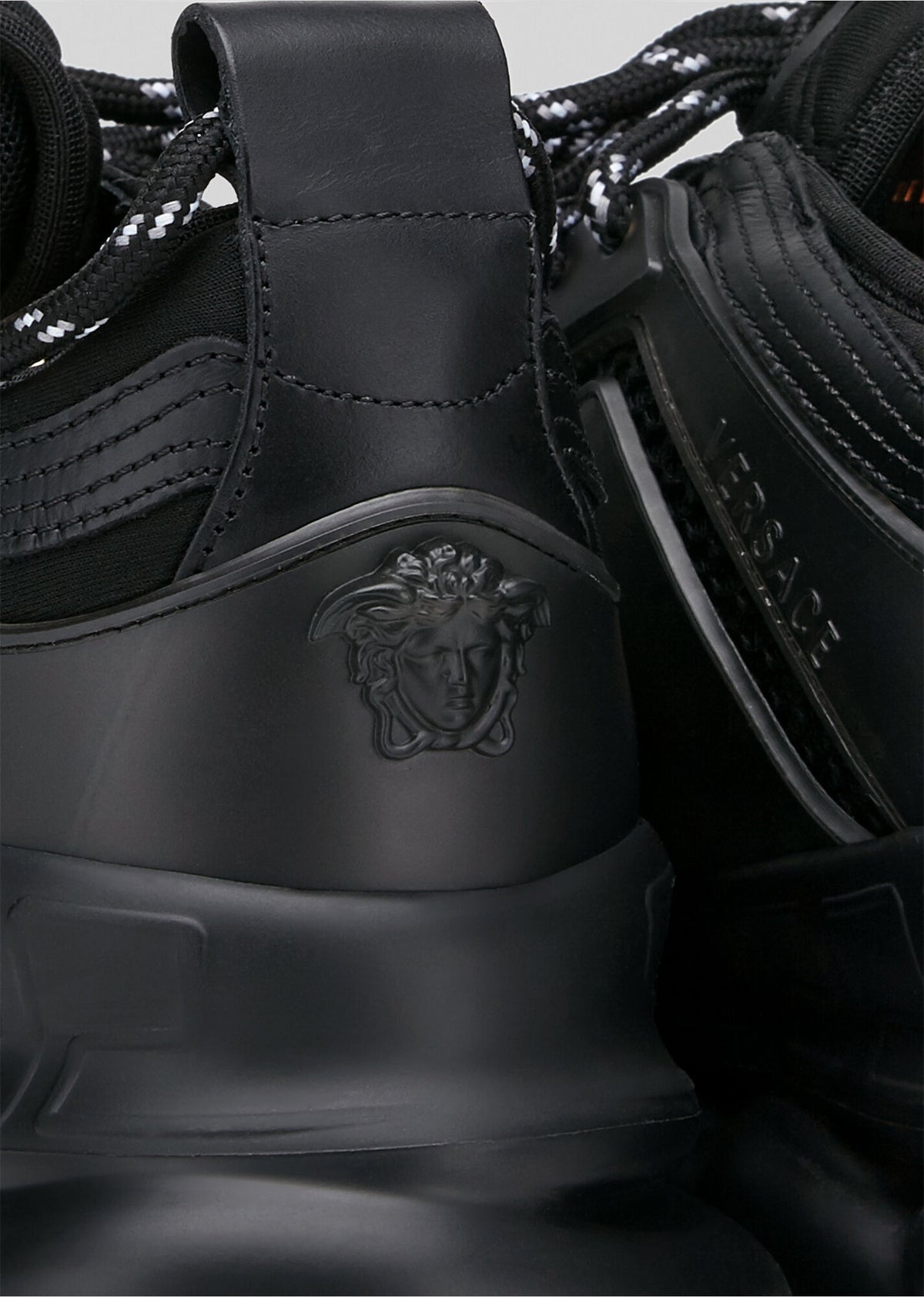 versace chain reaction black on feet