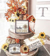 A monthly box of tiered tray decor.