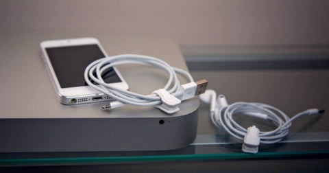 Magnetic cable tie for earphones serves as an organizer