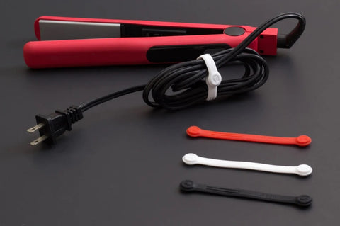 Hair iron cords with magnetic cable tie