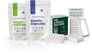 Image of empty capsules and gelatin capsules with a capsule filling machine next to it