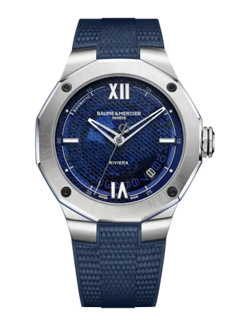 A summer spirit for the new Riviera models!  The Riviera, lifestyle icon of Baume & Mercier, takes on a lively, bright blue this summer that energizes its dial. In 42 mm Baumatic and self-winding versions, or in a 36 mm quartz version, the Riviera redefines its Mediterranean personality. Inspired by the carefree lifestyle of the French Riviera, this is the watch of casual elegance, symbolizing an easygoing view of refined watchmaking. It expresses the Baume & Mercier spirit, in the city and at the beach.  Immediately recognizable with its twelve-sided bezel, the Riviera watch embodies the Baume & Mercier savoir-faire in design and in combining materials that it has demonstrated since it was first released in 1973. Relaunched last year, it has won over hearts and wrists with its steel silhouette, expressing a vision of freedom, an offbeat elegance, and a certain idea of watchmaking.  ***  The 42 mm Riviera - Baumatic: taking the plunge into the blue  This summer, the emblematic model of the collection – the 42 mm Riviera Baumatic – embraces blue: a color associated with wide-open spaces, infinite horizons, and the passion of the ocean. This powerful, bright blue is a symbol of freshness but also serenity. In its 42 mm Baumatic version, the Riviera also takes the plunge with subtle technical and aesthetic developments. With a smoky blue sapphire dial featuring mesh decor with nautical accents, it immediately evokes the Baume & Mercier expertise in design, attention to shapes, and bold intention. It also asserts a certain number of distinctive features which set it apart from the other models from the collection, including openworked hands, four sand-blasted black DLC-coated steel screws, and the counter-balance of its seconds hand, which is stylized to depict the Phi symbol so emblematic of the House. Its steel case with slender, sporty lines was designed to be water-resistant up to 100 meters. Athletic and understated, the Riviera name appears at 6 o’clock, and the discreet Baumatic name appears between 10 and 11 o’clock.  The anodized blue aluminum ring on the sides of the case and the strip of color at the center of its crown add an unexpected touch of technical finesse that subtly coordinates with the hue of the dial.  This summer’s 42 mm Riviera Baumatic is driven by a Baume & Mercier movement with proven performances: a five-day power reserve, a daily precision of -4 s/+6 s, and a solid protection against magnetic fields. With a power reserve of 120 hours, this new Riviera Baumatic plays in the major leagues. It may be forgotten on a night table from a Thursday evening to a Tuesday morning and still be on time and full of energy. Like an invitation to get away, travel, and discover something new. The versatile 42 mm Riviera Baumatic is mounted on an interchangeable integrated strap in blue rubber with a canvas decoration. Its design offers optimal comfort in wear, particularly with ergonomic curves at its attachment links.