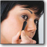 applying liquid eye liner