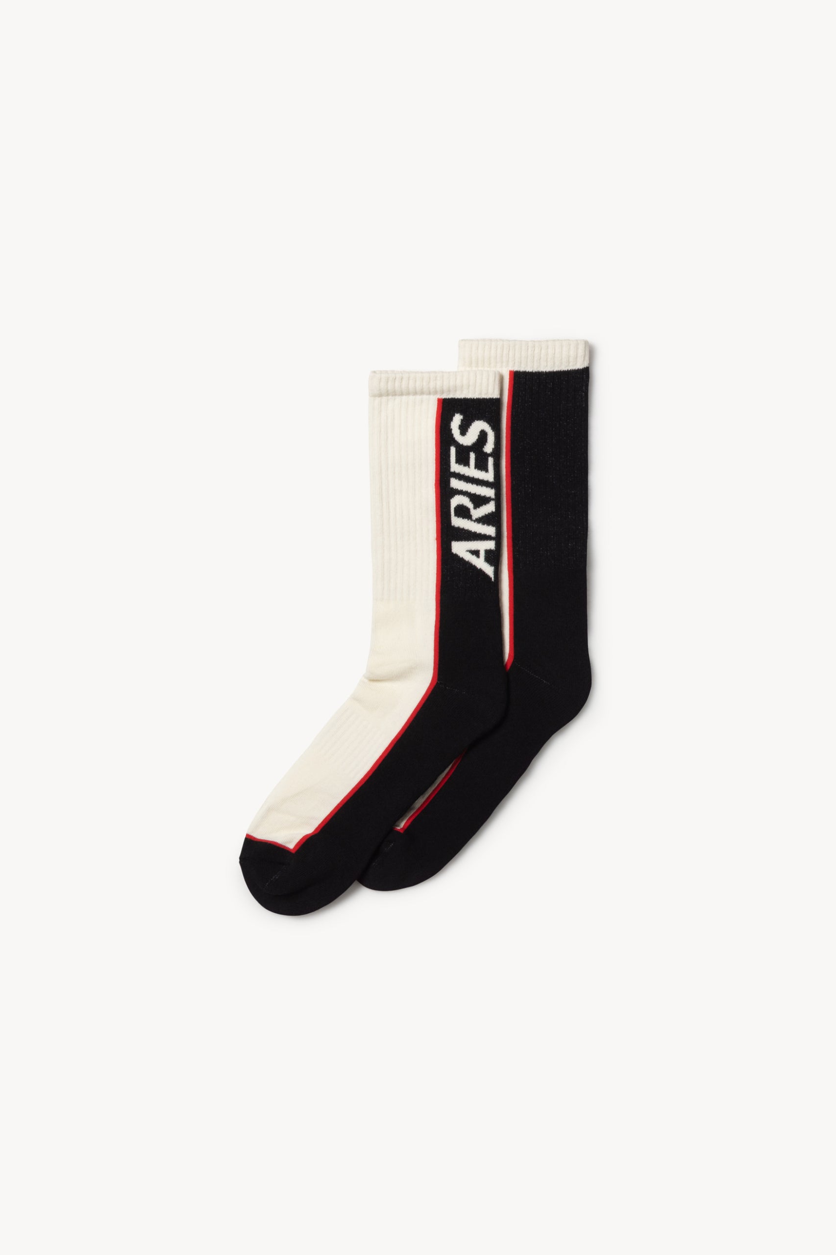white socks with black stripe that reads aries