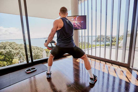 Man working on a Les Mills on demand workout