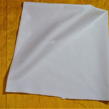 White folded fabric with ironed corners